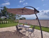 sky, outdoor, furniture, umbrella, table, chair, coffee table, shade, tent, bench